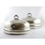 A pair of early 19th century old Sheffield plated graduated meat dish covers, unmarked circa 1820-