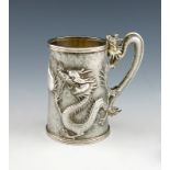 A 19th century Chinese Export silver mug, by Cumwo, Hong Kong, circa 1870, tapering circular form,