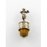 A Victorian silver bottle stopper. by Joseph Angell, London 1859, modelled as a standing maiden