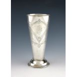 A Russian silver beaker, 1908-1917, maker's mark B.P, tapering circular form, engraved foliate