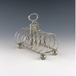 A 19th century Chinese Export silver seven-bar toast rack, by Yatshing, Canton circa 1830,