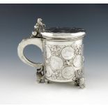 An 18th century Scandinavian silver peg tankard, maker's mark E.P, circa 1708, cylindrical form, the