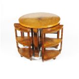 An English Art Deco walnut veneer nest of tables, circular with four smaller quadrant tables, 61cm.