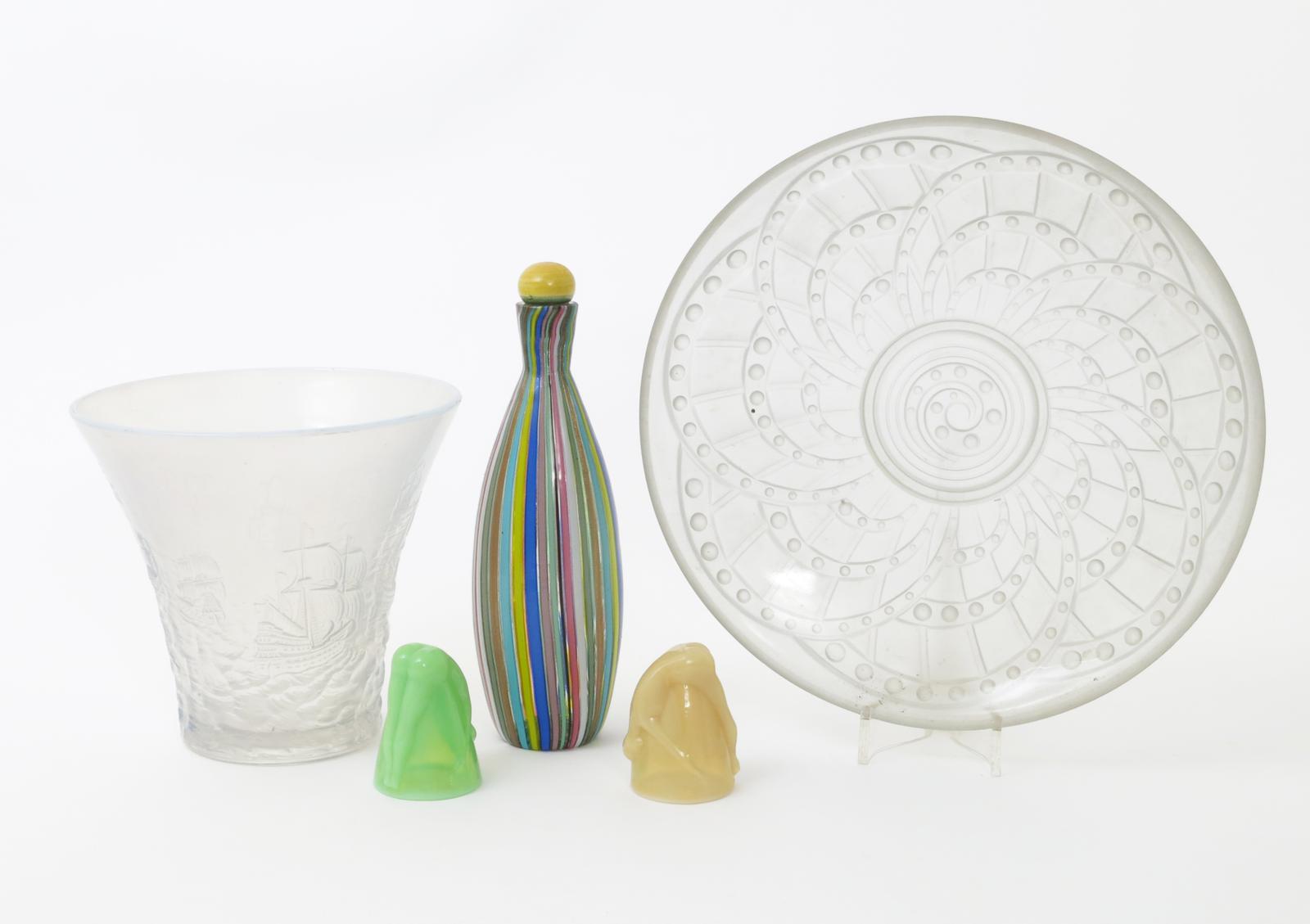 A Landier opalescent glass dish, moulded in low relief with radiating geometric swirls, an