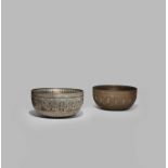 A MASSIVE PAIR OF INDIAN SILVER AND COPPER GUJARAT-STYLE BOWLS, LATE 19TH CENTURY The exterior