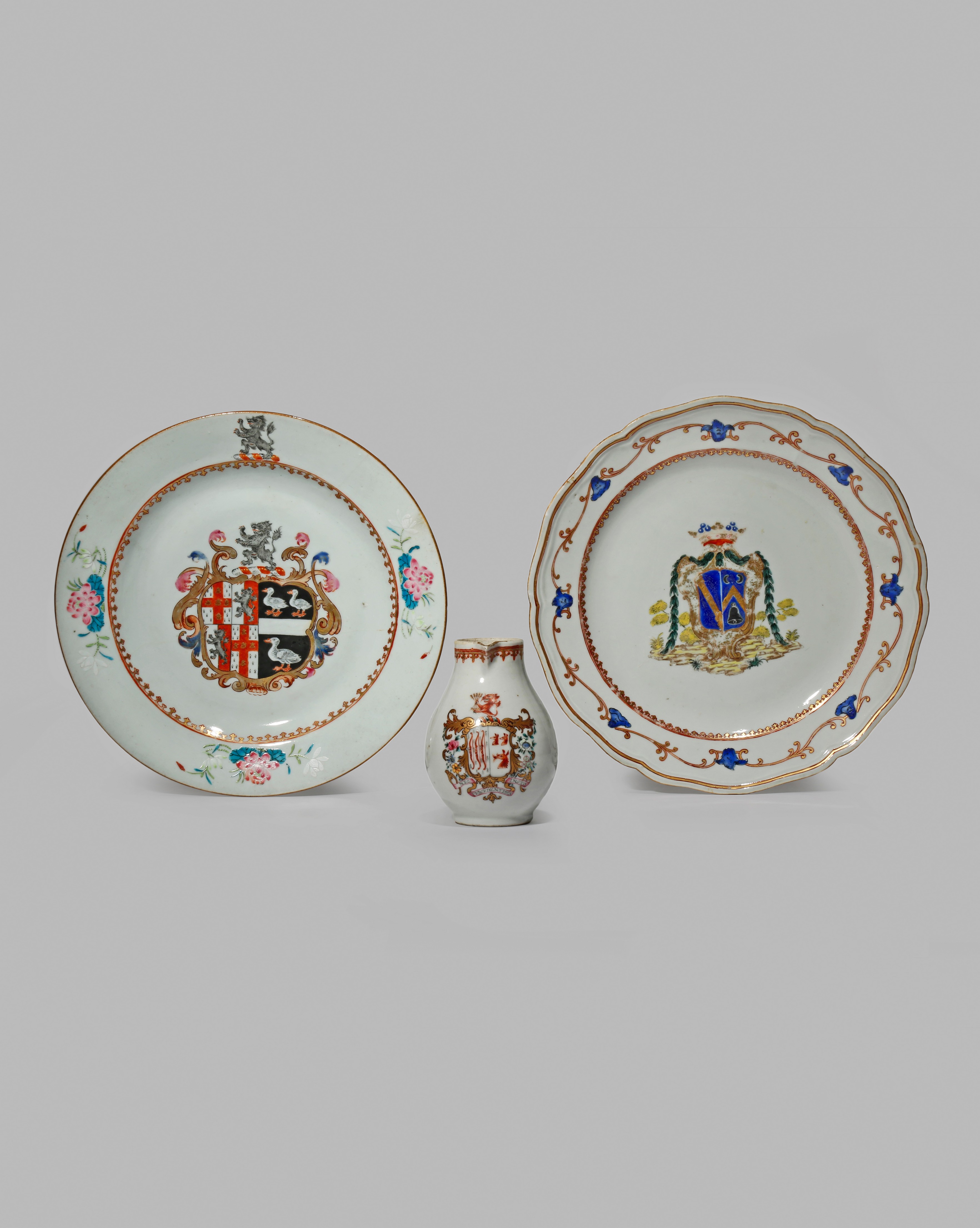 THREE CHINESE ARMORIAL ITEMS, 18TH CENTURY Comprising a jug, painted with the arms of Bowes impaling