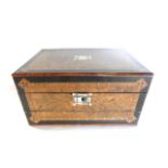 A good quality 19th century travelling box principally in walnut veneer with extensive ebonised