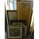 A collection of oriental pictures and prints including a watercolour of a bird amongst prunus