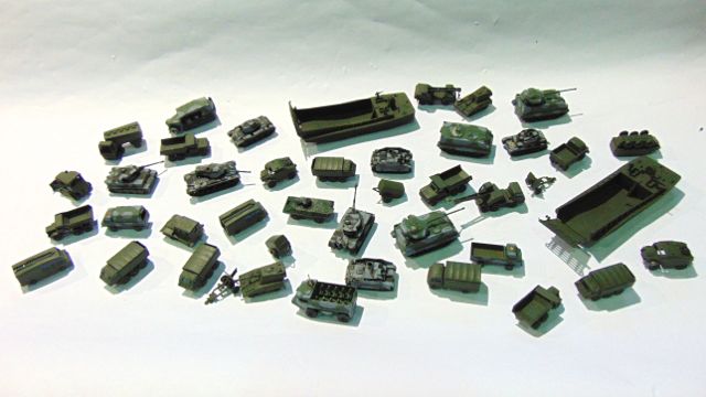 A small collection of model military vehicles