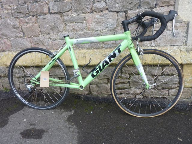 A Giant boys racing bicycle, TCR performance series with lightweight tubular frame and mint green