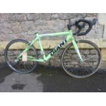 A Giant boys racing bicycle, TCR performance series with lightweight tubular frame and mint green