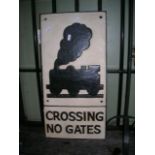 A cast iron railway sign/notice of rectangular form with raised relief steam train and lettering