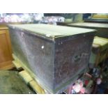 A Victorian stained pine blanket box with hinged lid and iron work carrying handles together with