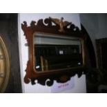 A good quality Georgian style wall mirror of rectangular form with bevelled edge plate within a