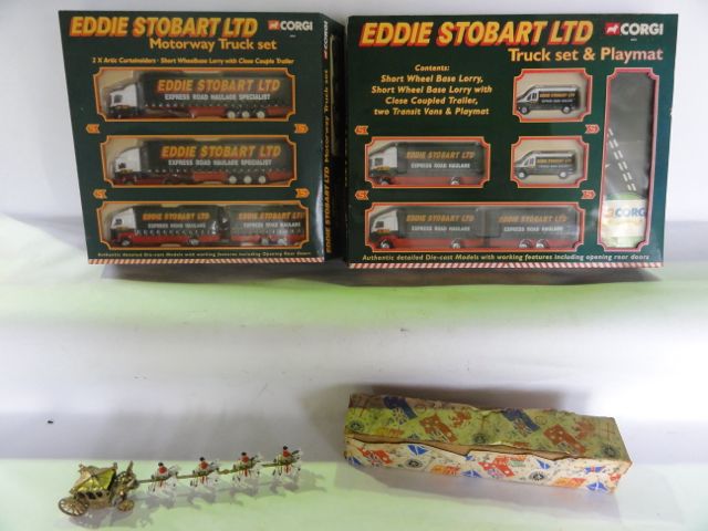 A boxed Eddie Stobart Ltd motorway truck set by Corgi to include 2 x artic curtainsiders, short