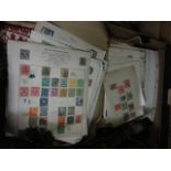 A box of miscellaneous unsorted stamps, books, horse brasses, etc