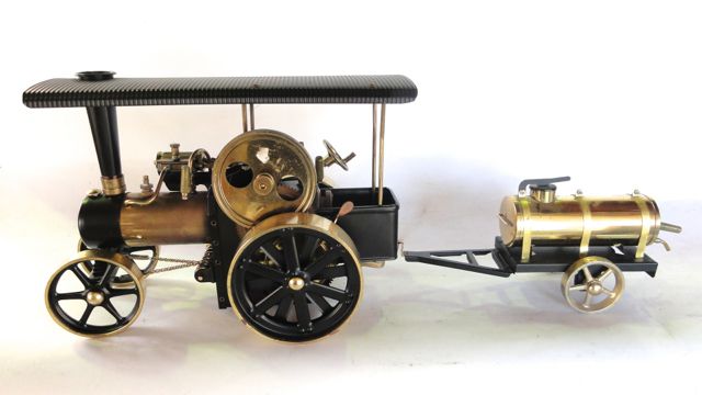 A boxed Wilesco model steam roller traction engine with working components, made in West Germany,