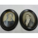 Two 19th century portrait miniatures of oval form, probably a pair, showing a bust length portrait