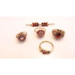 A 9ct gold gem-set bar brooch, 1.7g; a ruby and diamond cluster ring, in 10ct gold, size K 1/2;