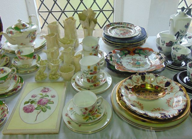 A collection of 19th century and later ceramics including Royal Worcester ivory glazed leaf