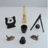 An Irish treen cauldron and stand, whist marker, Japanese ivory figure of a fisherman, two small