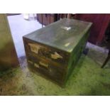 A vintage trunk with canvas and steel banded borders