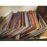 An extensive collection of mixed LPs including some classical, a quantity of vintage cigarette cards