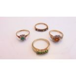Four gem-set rings, each in 9ct gold, 8g in total (4)