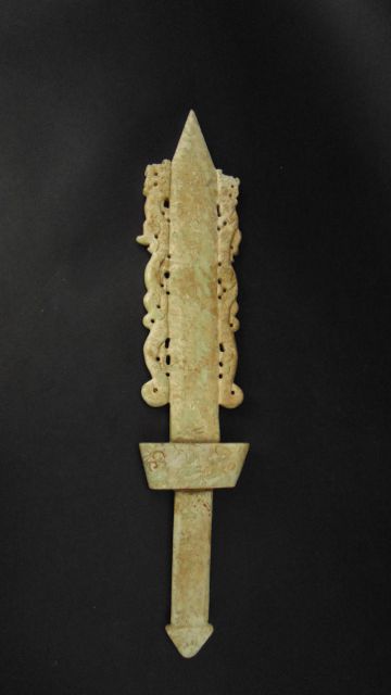 A soapstone dagger, Eastern with engraved detail and trailing dragon detail, 45 cm