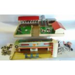 A vintage painted ply model of a farmyard complete with stables, etc, bearing plaque, an Elf