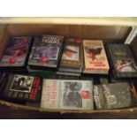 A box containing a large quantity of Adventure and Western videos including a large number featuring