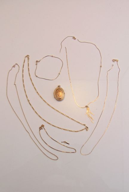 Four 9ct gold necklaces, various designs, 6.2g in total; two 9ct gold bracelets, 1.5g in total;