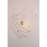 Four 9ct gold necklaces, various designs, 6.2g in total; two 9ct gold bracelets, 1.5g in total;