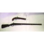 An antique flintlock rifle with timber stock bearing incised mark Paviot together with a