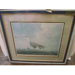 A signed coloured print after Gerald Coulson showing Concorde taking off, signed bottom right Gerald