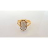 A cameo ring, mounted in 22ct gold, size P