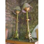 A pair of reproduction ecclesiastical Gothic Revival desk lamps with ormolu type finish detailing