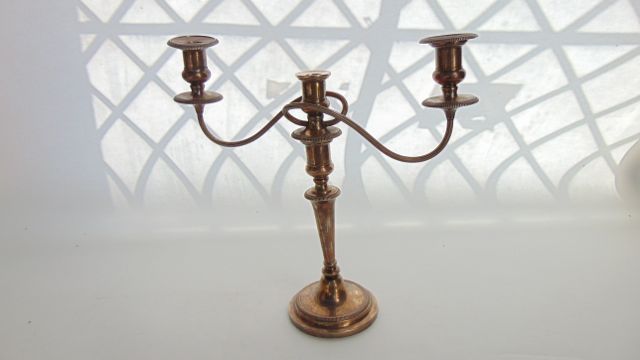 A three-light silver candelabrum, Barker Ellis Silver Co., Birmingham, 1964, the column stem