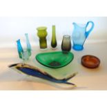 A selection of decorative coloured glass to include a Murano model of a fish with deep blue and
