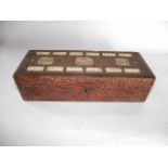 A 19th century eastern cribbage/games box with all over intricately carved shallow and floral