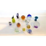 A selection of glass paperweights, fourteen approximately, to include a mushroom shaped Murano style
