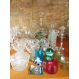A selection of glassware to include a clear cut bowl with extensive cut and etched detail, a