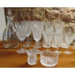 A good quality clear cut glass club decanter with slice cut shoulders, disc shaped stopper and