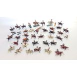 A selection of vintage painted lead models, predominantly Britains, of mounted military personnel of