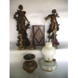 A pair of spelter figures of maidens together with a glass ceiling lantern, each side decorated with