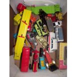 A box containing a small selection of die cast model vehicles to include examples by Dinky, the