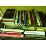 Four boxes containing an extensive collection of biographies, autobiographies, literary essays