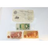 A white five pound note dated 4th February 1952, a one pound note and two ten shilling notes