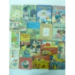 A collection of vintage children's books including a number of Ladybird volumes, Enid Blyton's stamp