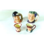 Two large Royal Doulton Character Jugs - Gone Away D6531 and Bacchus D6499 together with two smaller